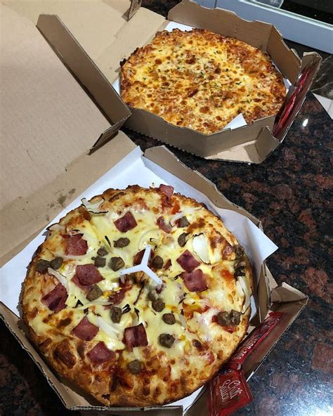 Berapa Kalori di Cheeseburger Klasik Domino’s