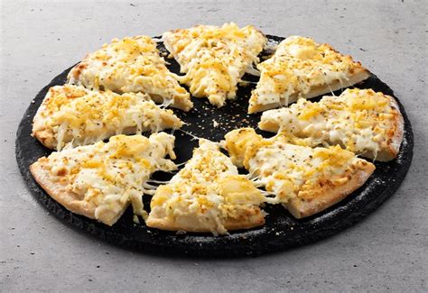 Kualitas Pizza yang Tidak Kalah dengan Citra “4 Cheese Domino