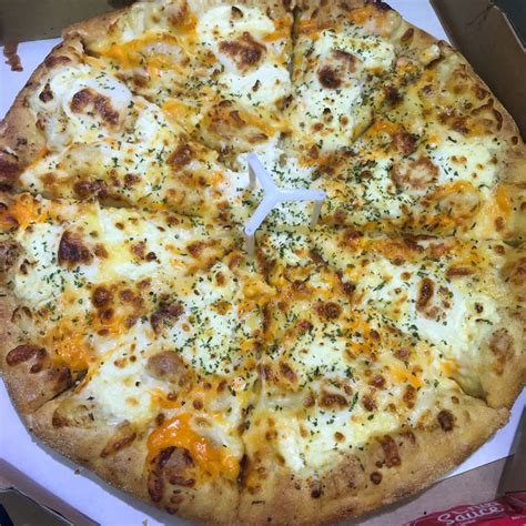 Get Your Share of Mouth-Watering Cheese Burst Pizza from Domino’s