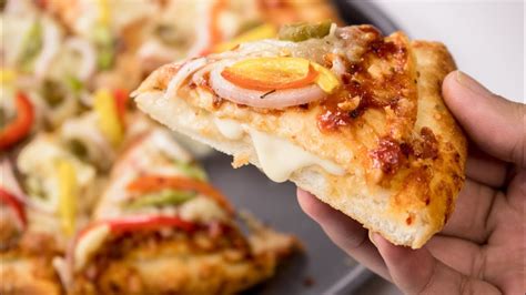 Get Your Share of Mouth-Watering Cheese Burst Pizza from Domino’s