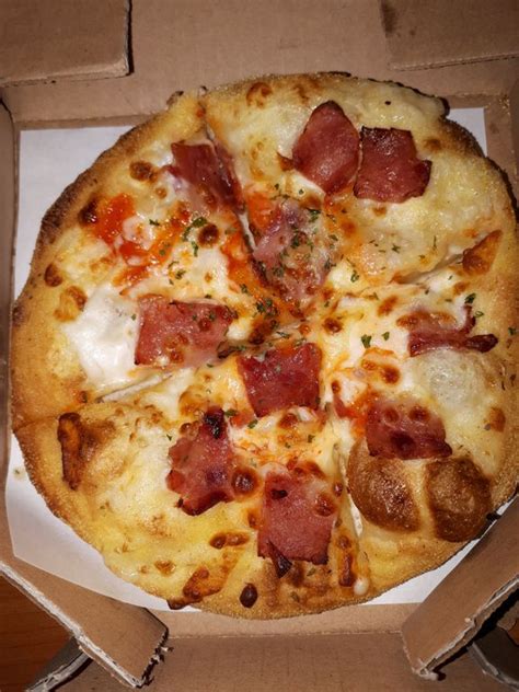 Makanan yang Berbeda: Pizza Signature Domino’s Korea dengan Saus Cream Truffle