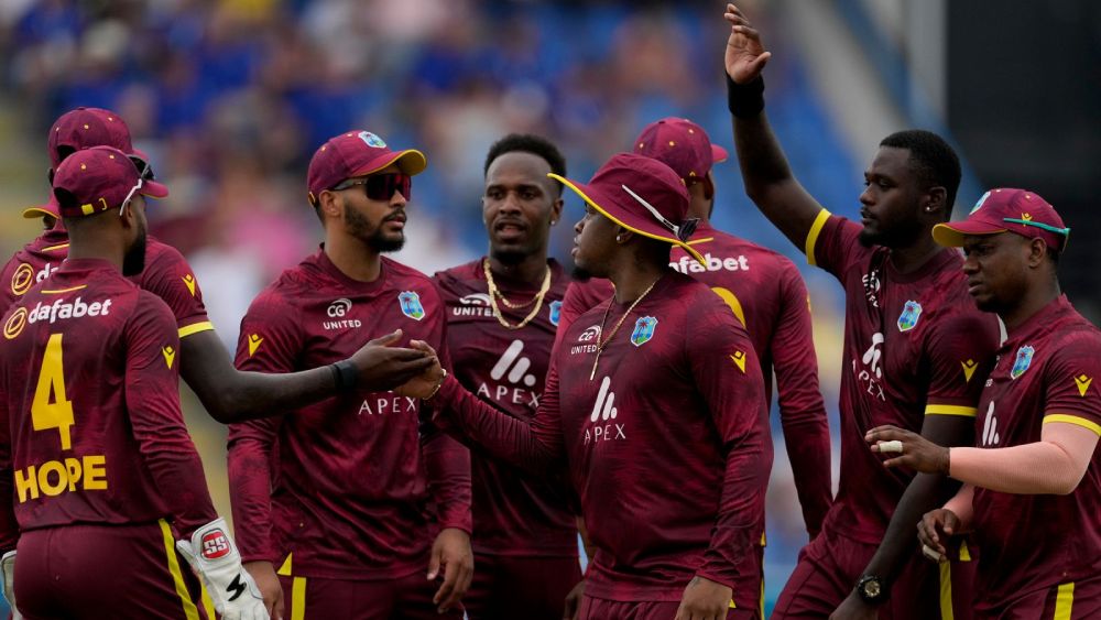 West Indies' players celebrate dismissing Phil Salt during at Sir Vivian Richards Stadium